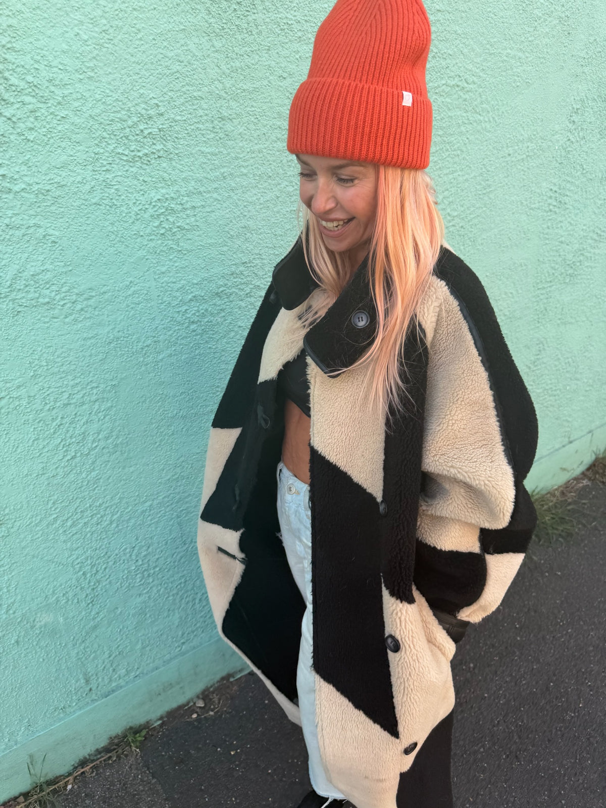 proud peach 100% merino wool beanie in burnt orange