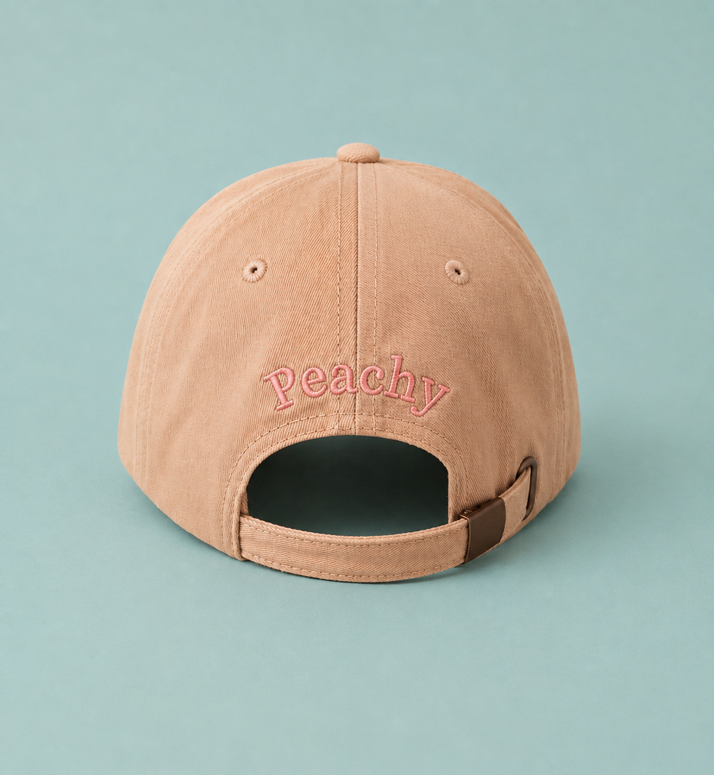 Proud peach silky lined classic cap in nude oat