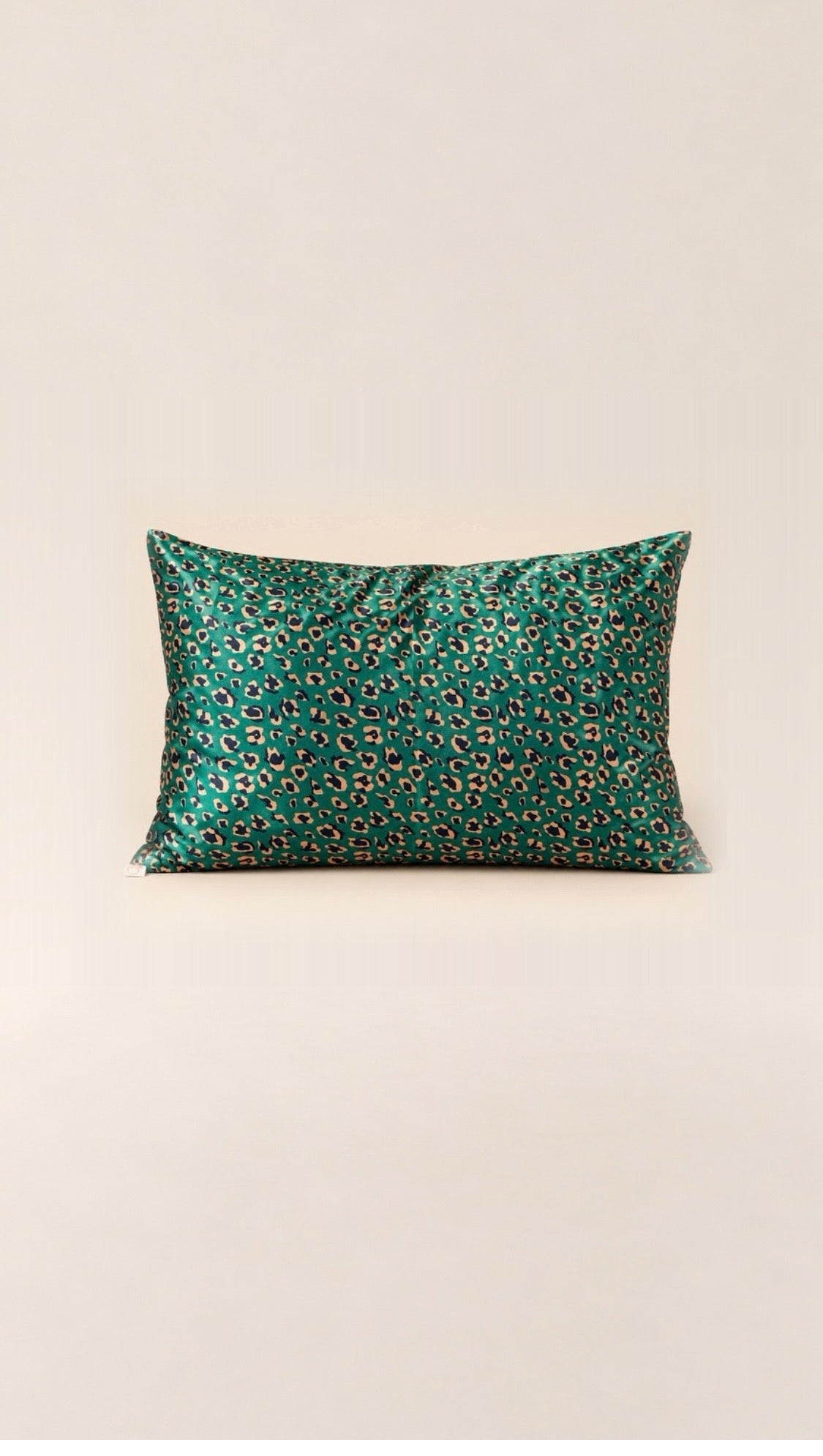 proud peach silky pillowcase in emerald leopard