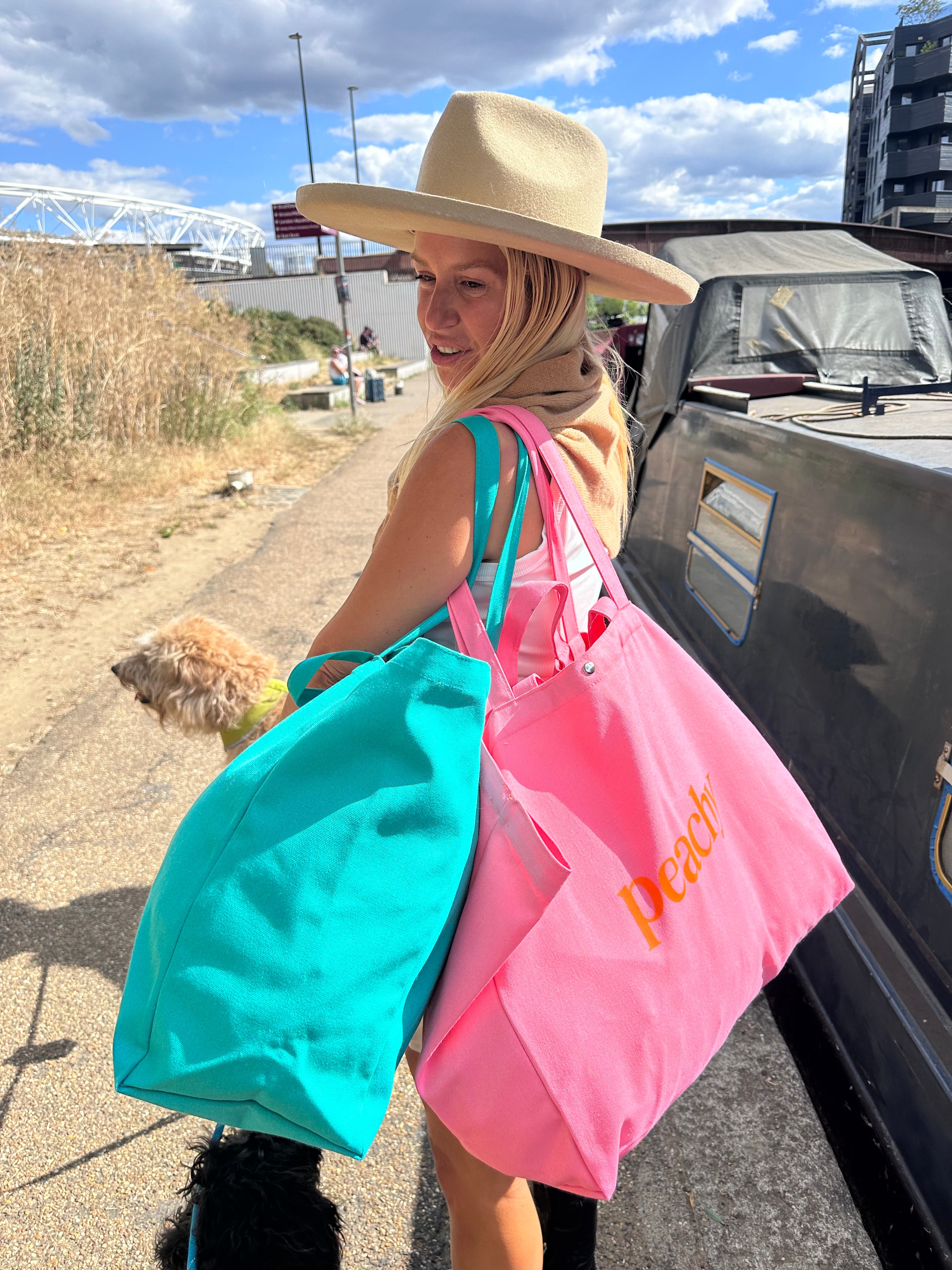 The proud peach extra large tote in pink