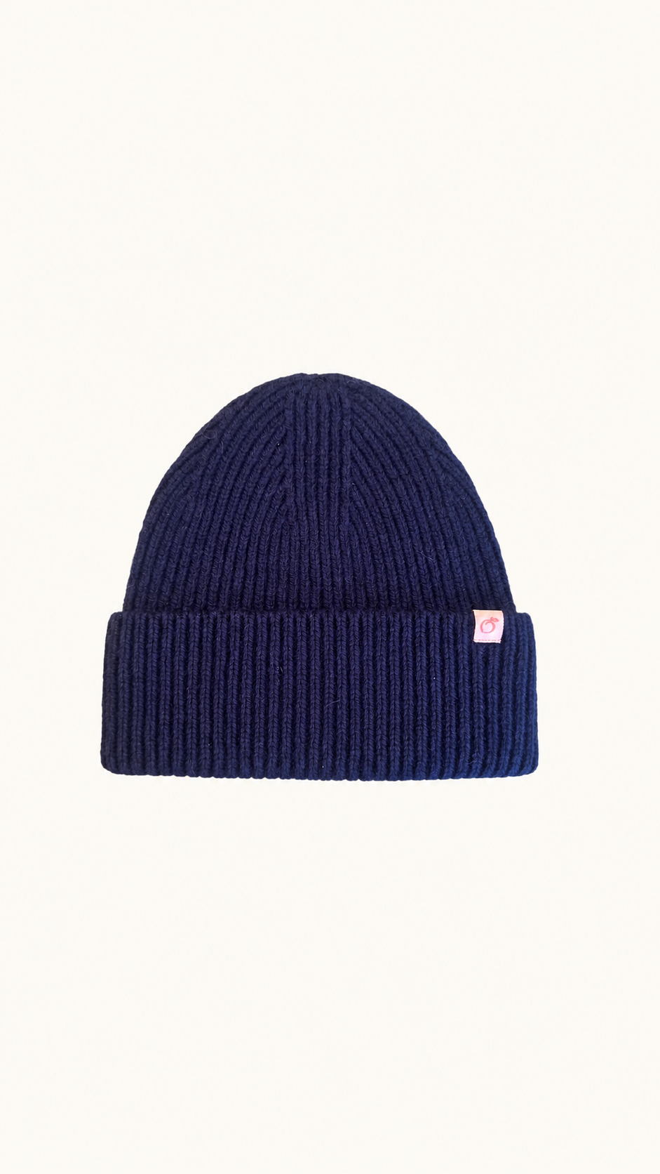 Proud peach 100% merino wool silky lined beanie in navy