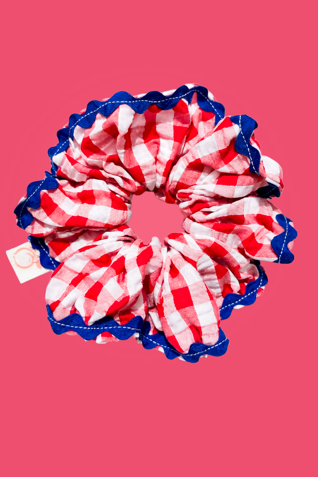 proud peach cotton gingham scrunchie in red whitw and blue edging