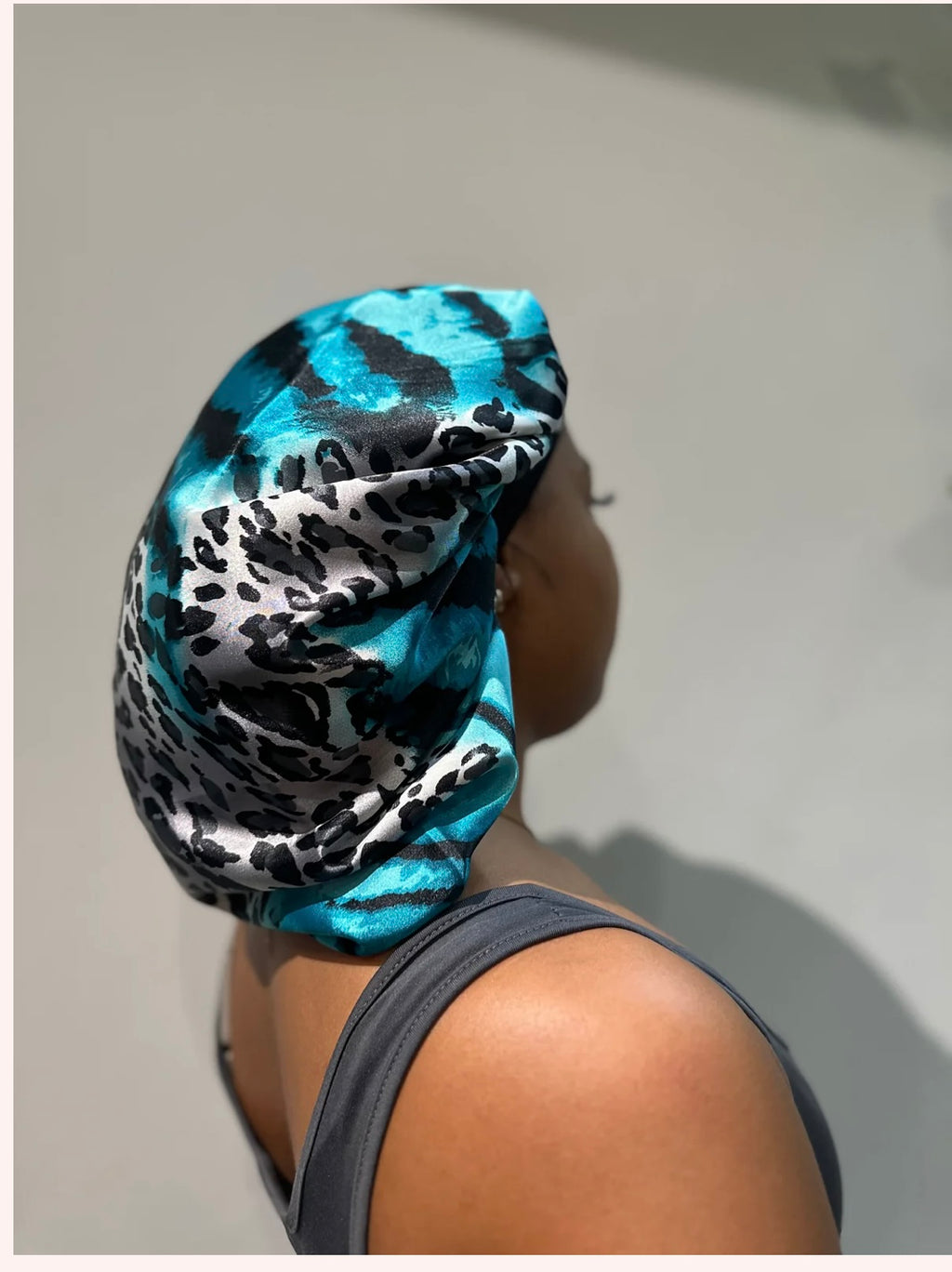 The proud mimi bonnet in blue animal print