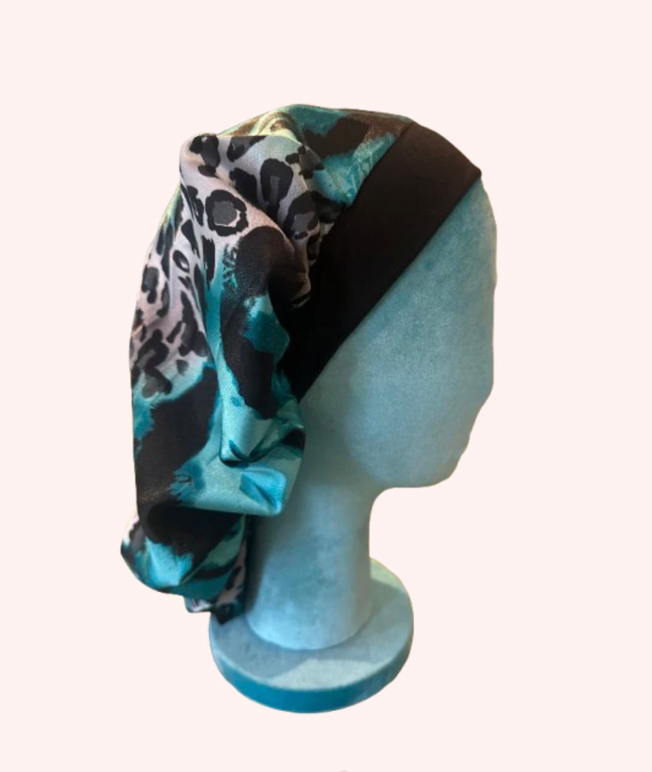The proud mimi bonnet in blue animal print