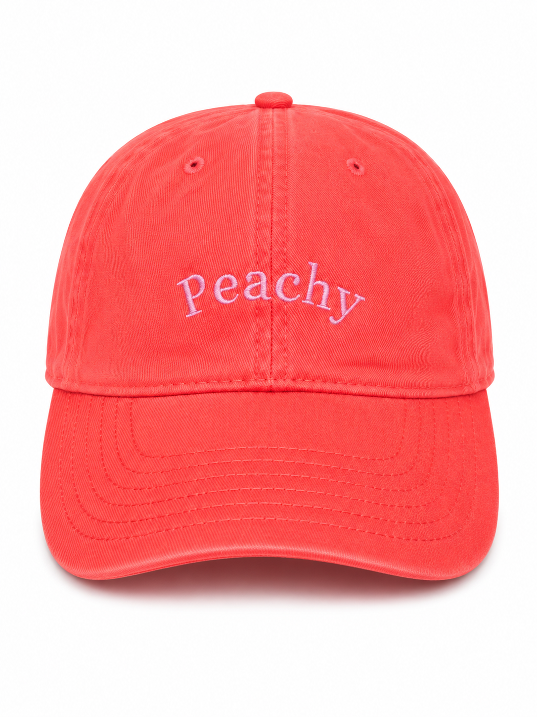 The proud peach silky lined PEACHY cap in coral