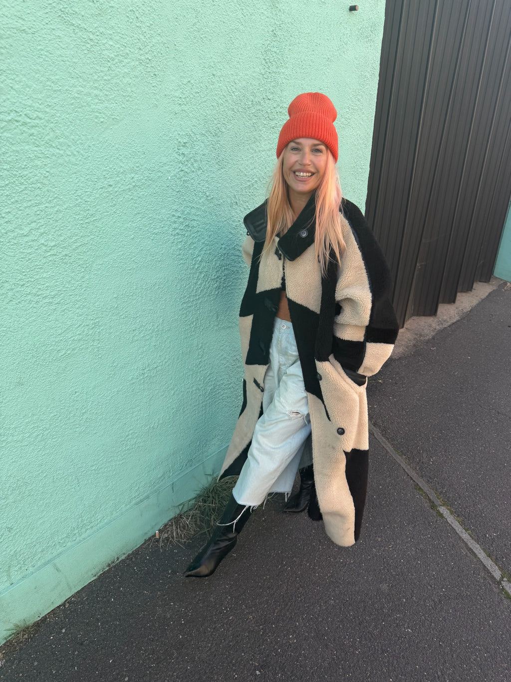 proud peach 100% merino wool beanie in burnt orange
