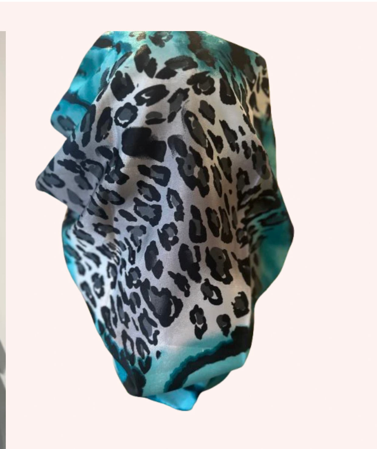 The proud mimi bonnet in blue animal print