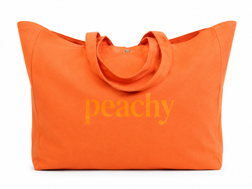The extra large proud peach tote in orange