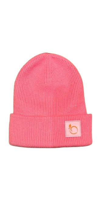 The peachy plush silky lined beanie in flamingo pink