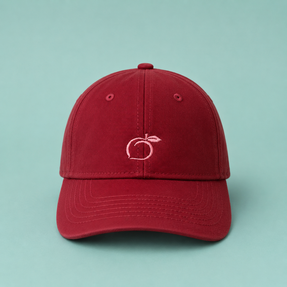 Proud peach classic cap in burgandy
