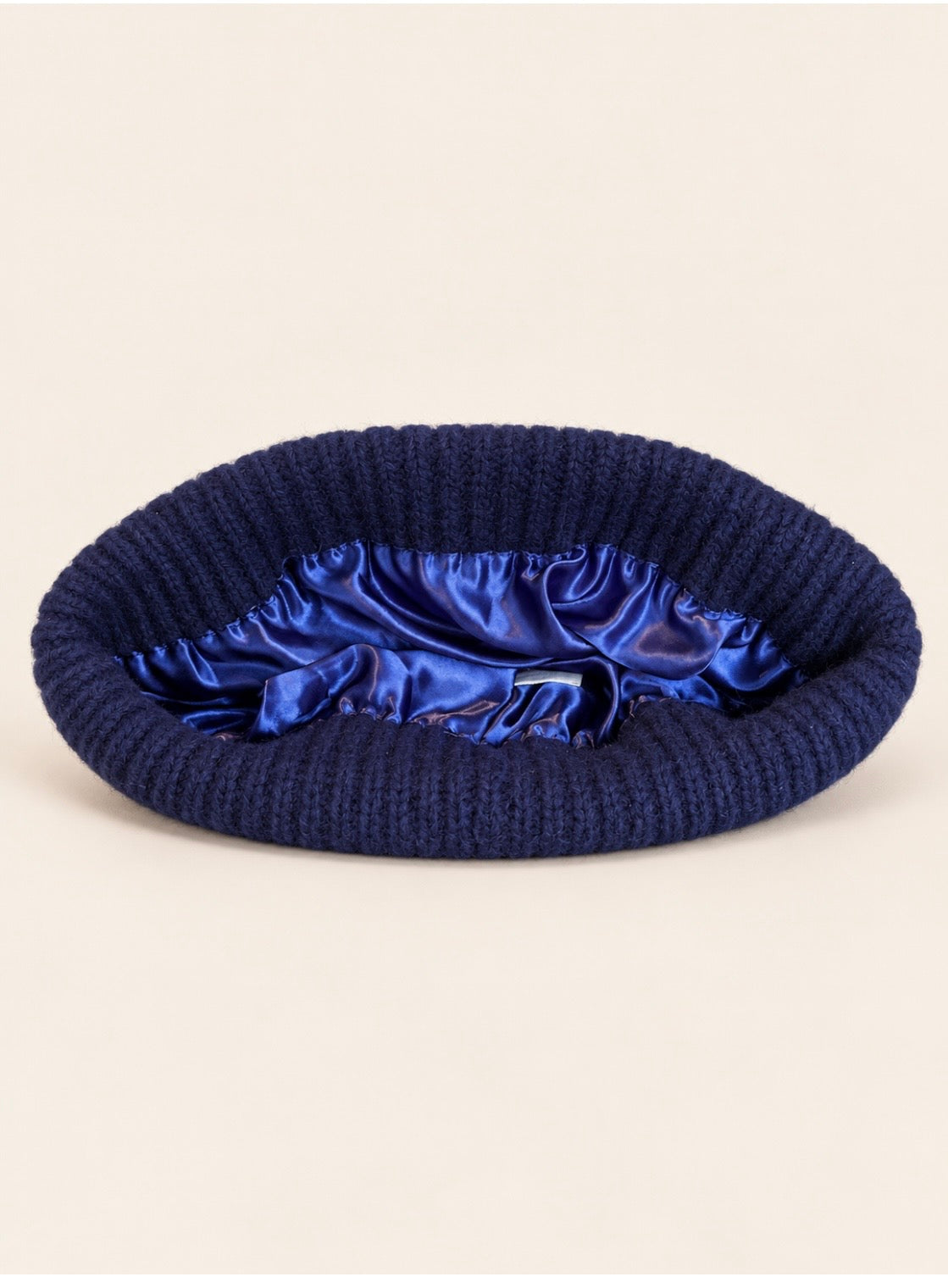 Proud peach 100% merino wool silky lined beanie in navy