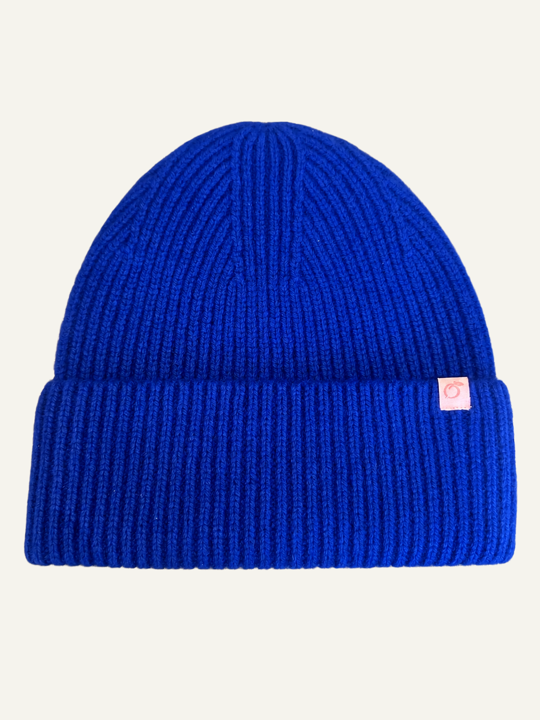 proud peach 100% merino wool silky linede beanie in colbat blue