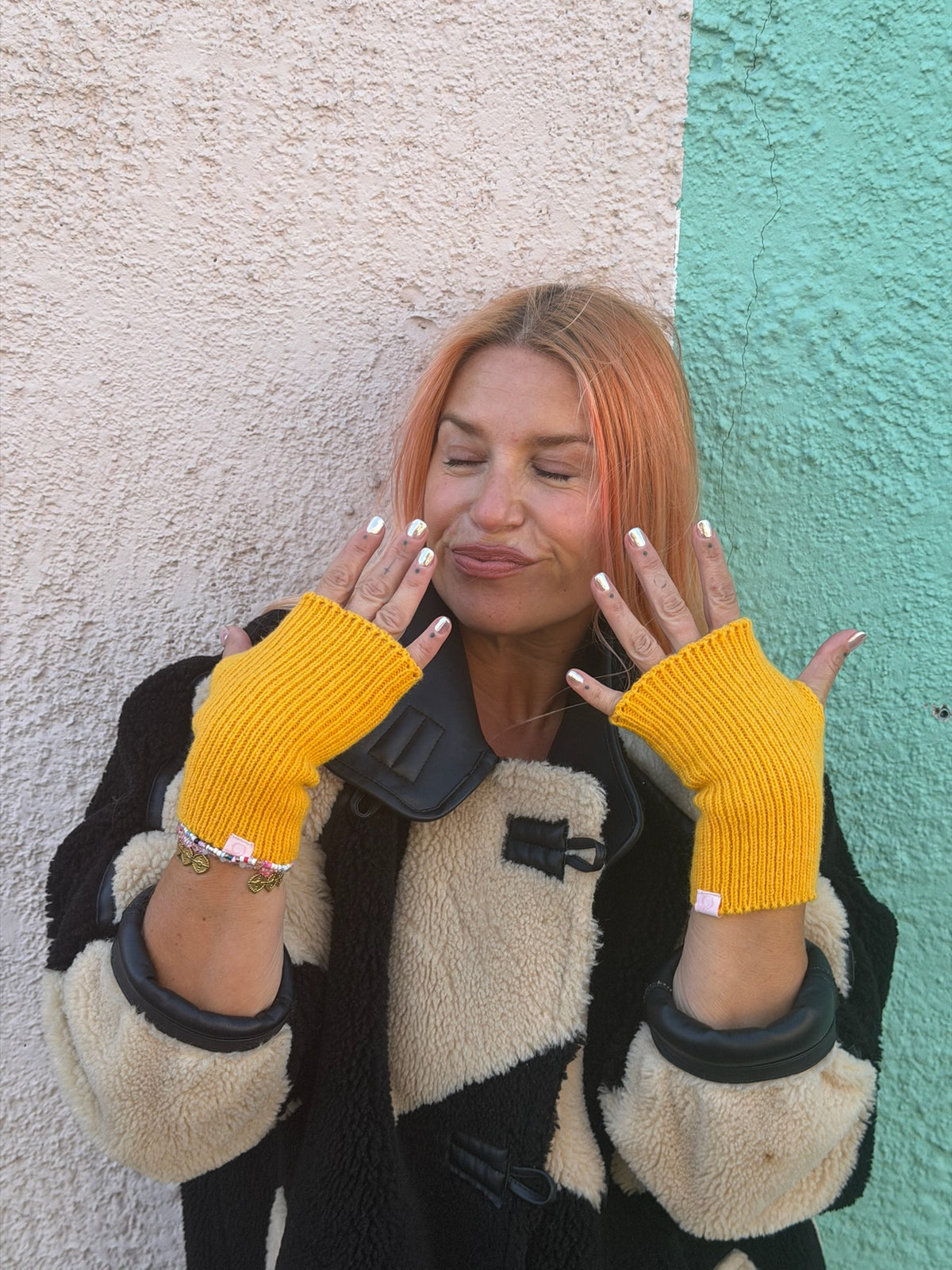 Proud peach fingerless gloves in yellow