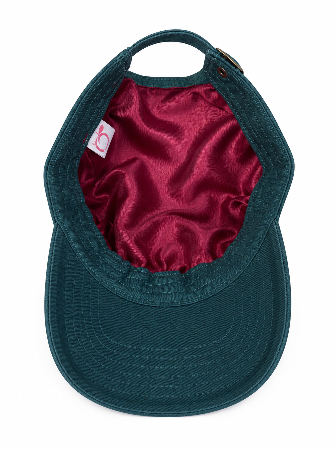 The proud peach silky lined PEACHY cap in deep forest green.