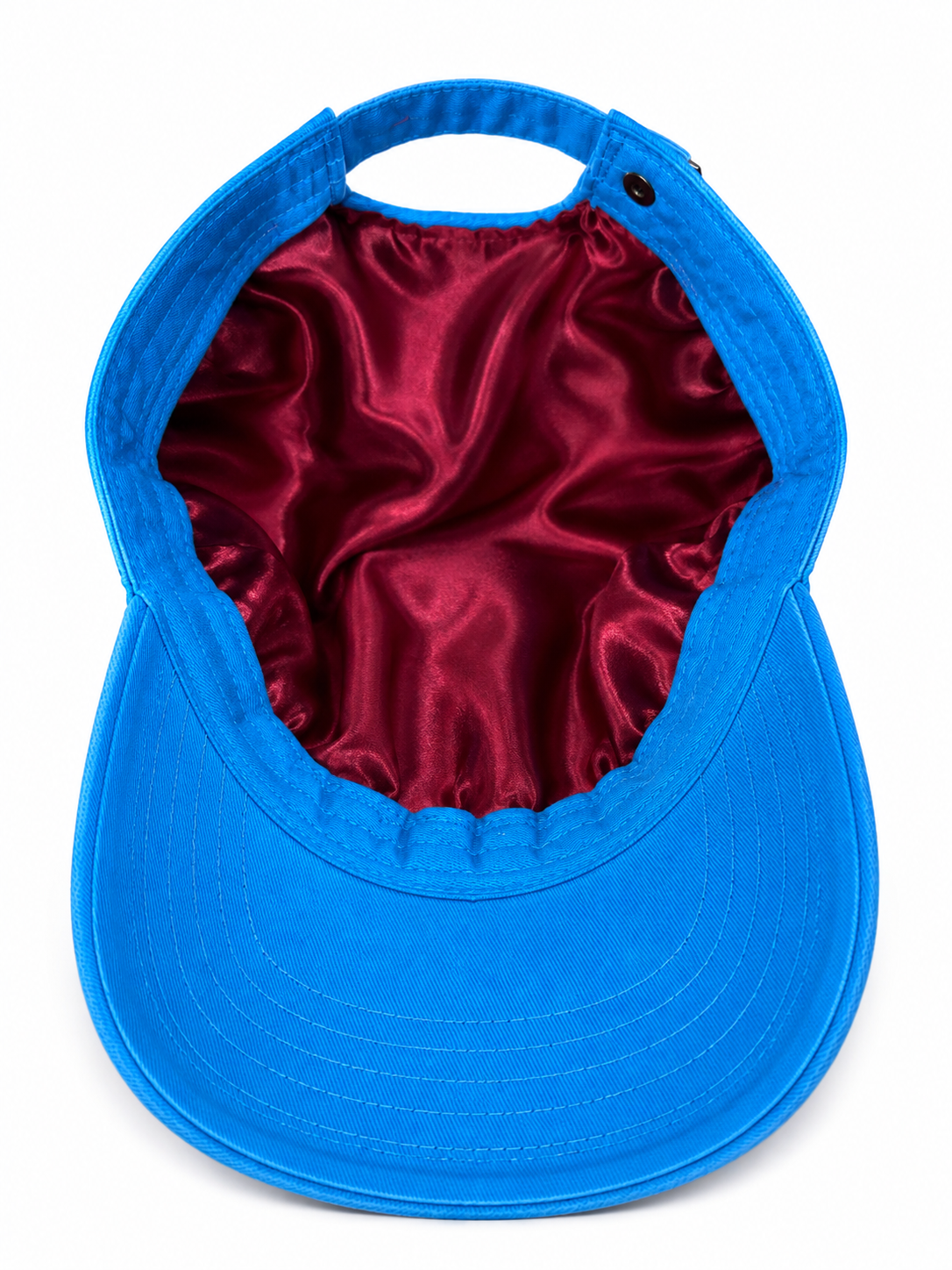 The proud peach silky lined PEACHY cap in electric blue