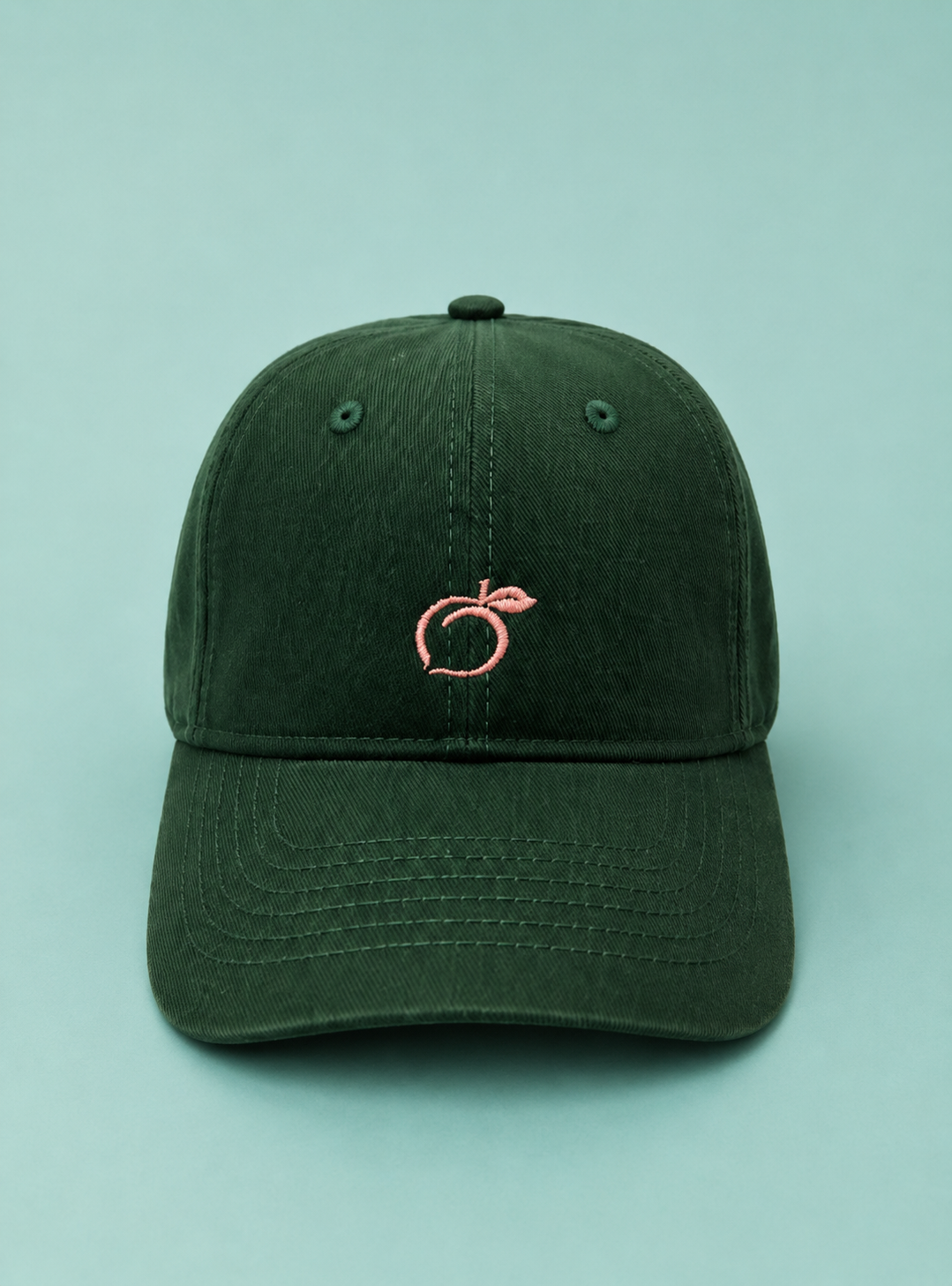 Proud peach silky lined classic cap in forest green