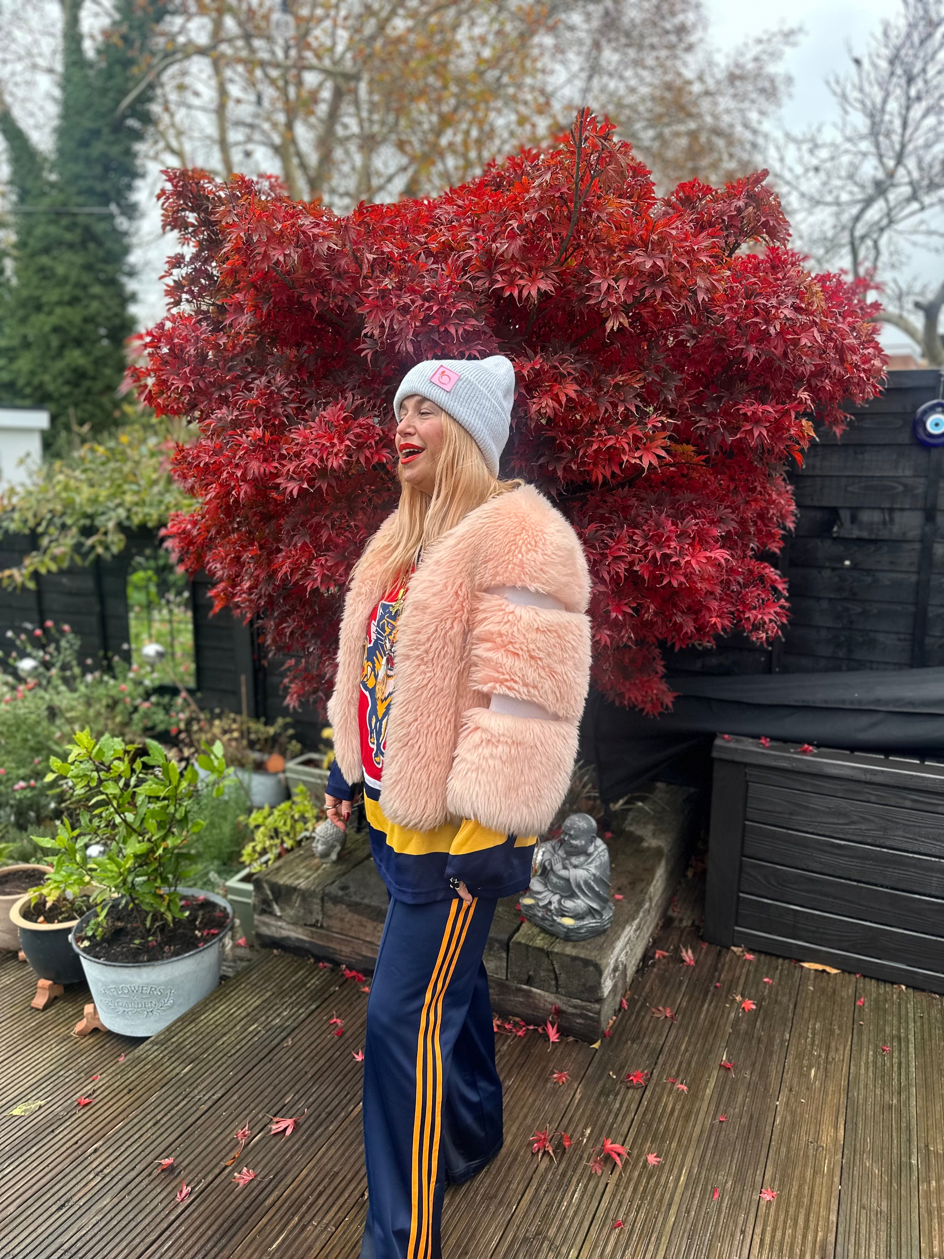 The peachy plush silky lined beanie in stone