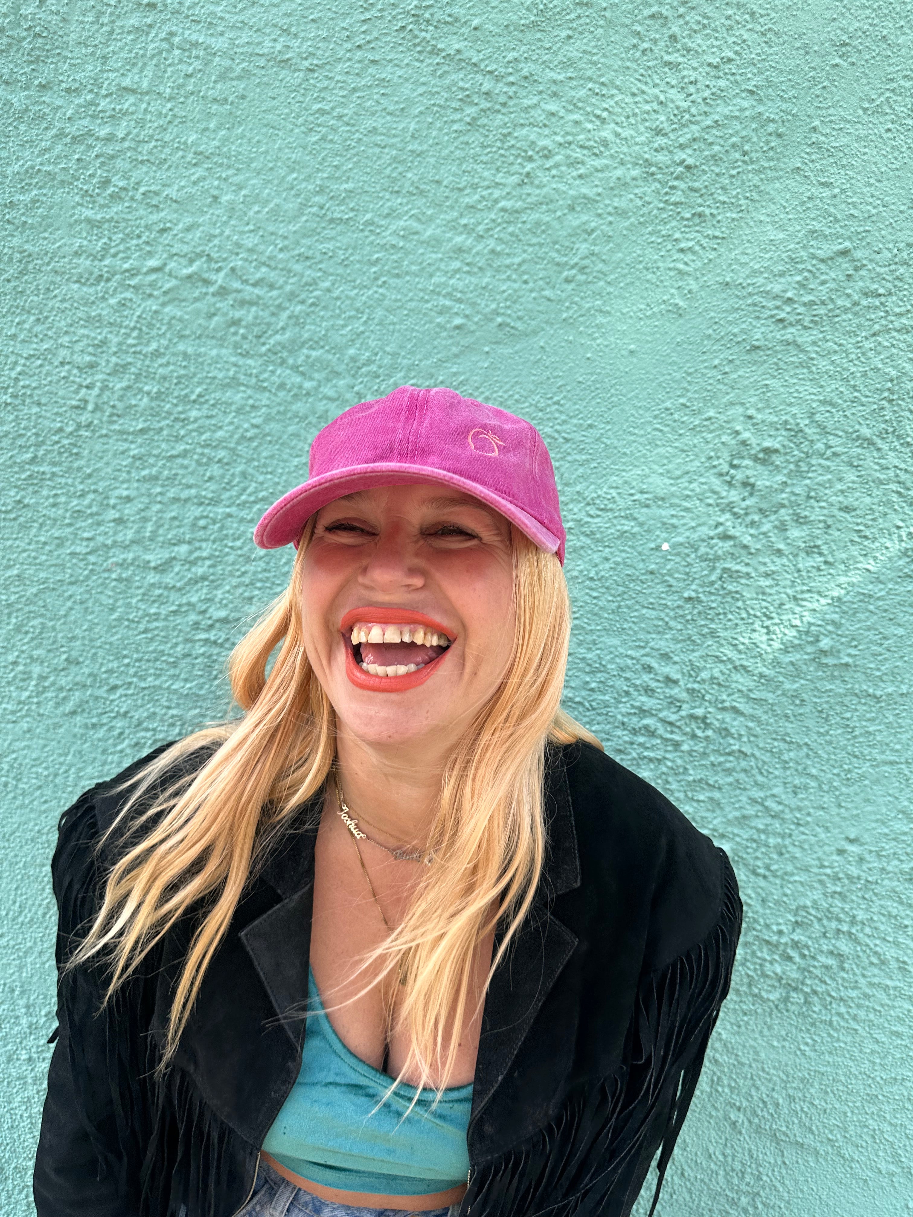 The proud peach relaxed effortlessly cool cap in hot pink SILKY LINED