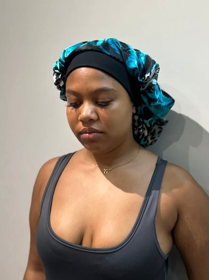 The proud mimi bonnet in blue animal print