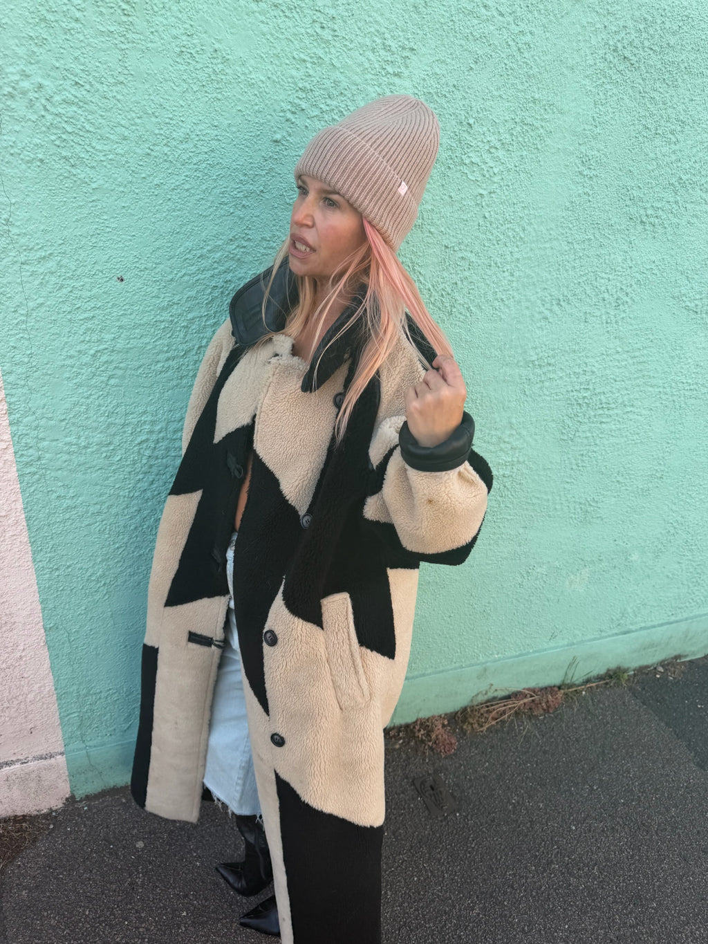 Proud peach 100% merino wool beanie in oat