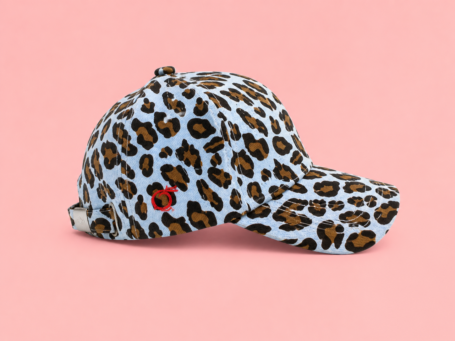The proud peach silky lined cap in blue leopard